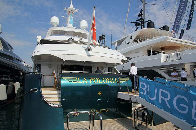 a large white boat with blue lettering aboard SIERRA 2 Yacht for Sale