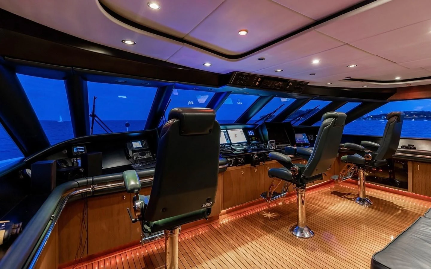 inside of a vehicle with chairs and a table and chairs aboard SIERRA 2 Yacht for Sale