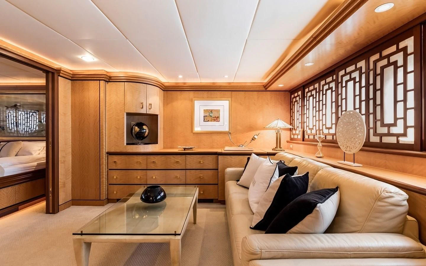 a living room with a couch and a television aboard SIERRA 2 Yacht for Sale