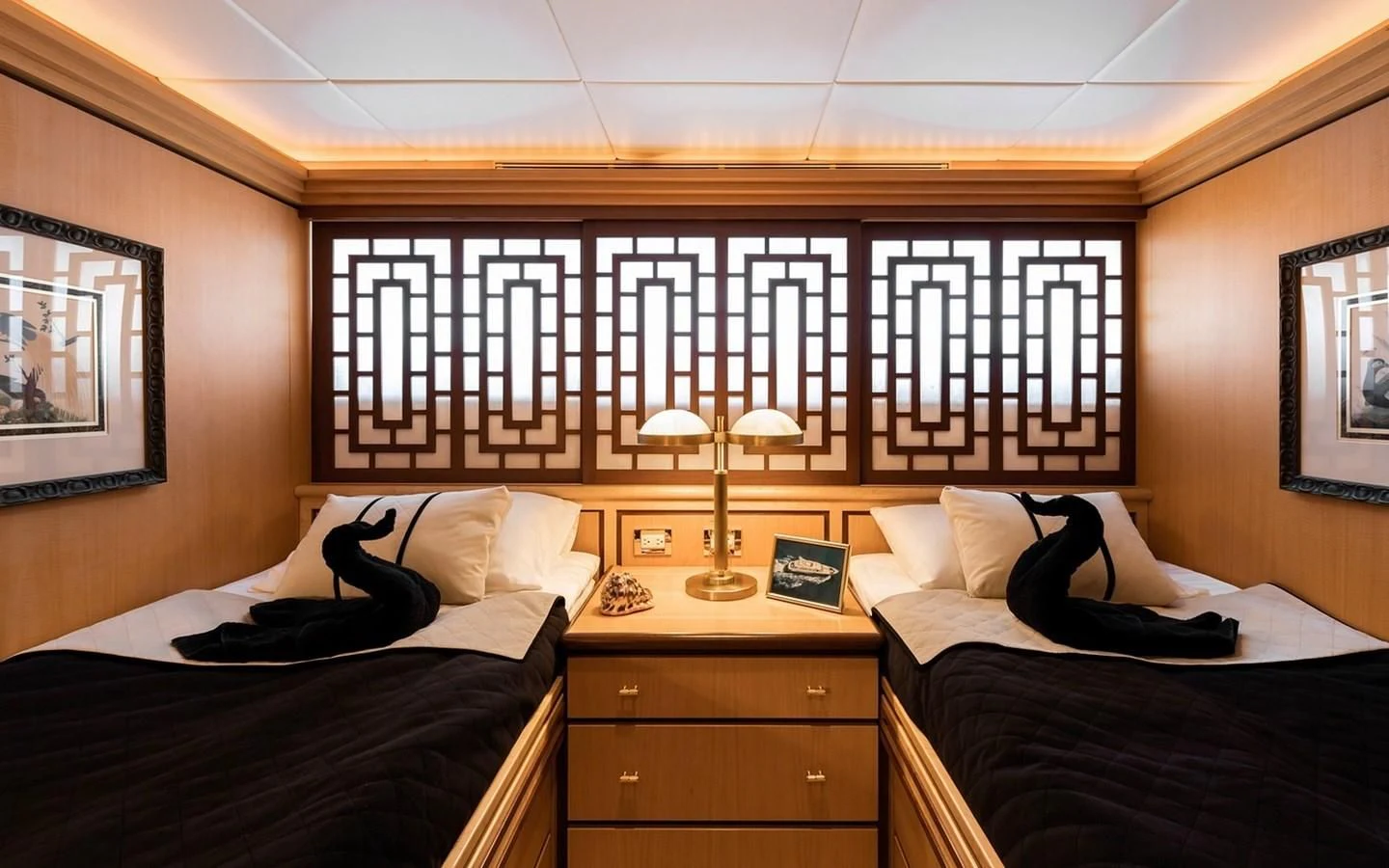 a couple of beds in a hotel room aboard SIERRA 2 Yacht for Sale