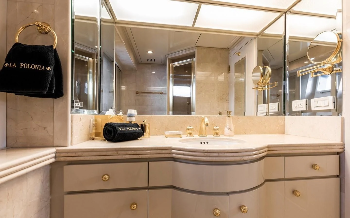 a bathroom with a large mirror aboard SIERRA 2 Yacht for Sale