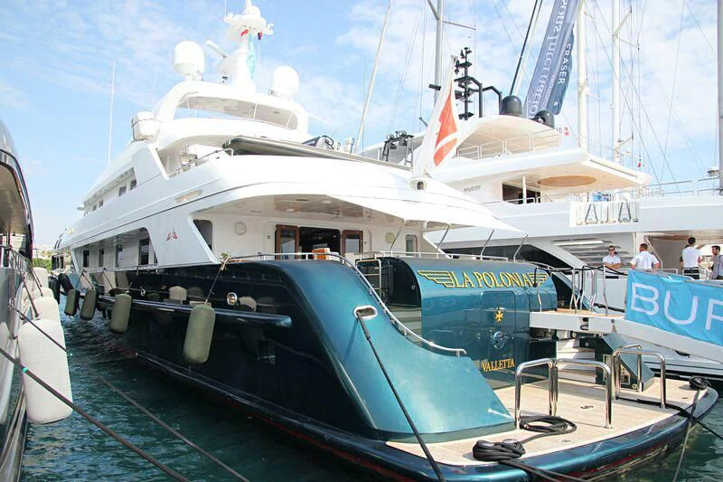 a boat docked at a pier aboard SIERRA 2 Yacht for Sale