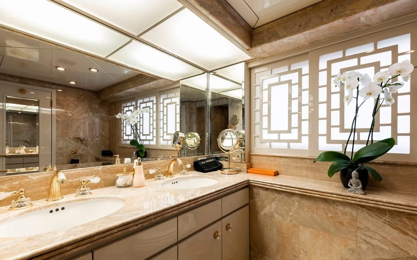 a bathroom with a large mirror aboard SIERRA 2 Yacht for Sale