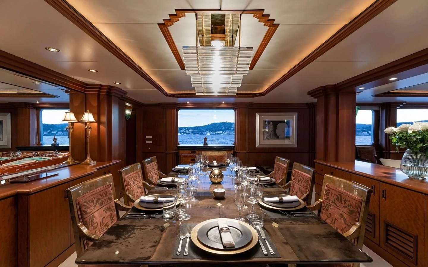 a dining room with a large table aboard SIERRA 2 Yacht for Sale