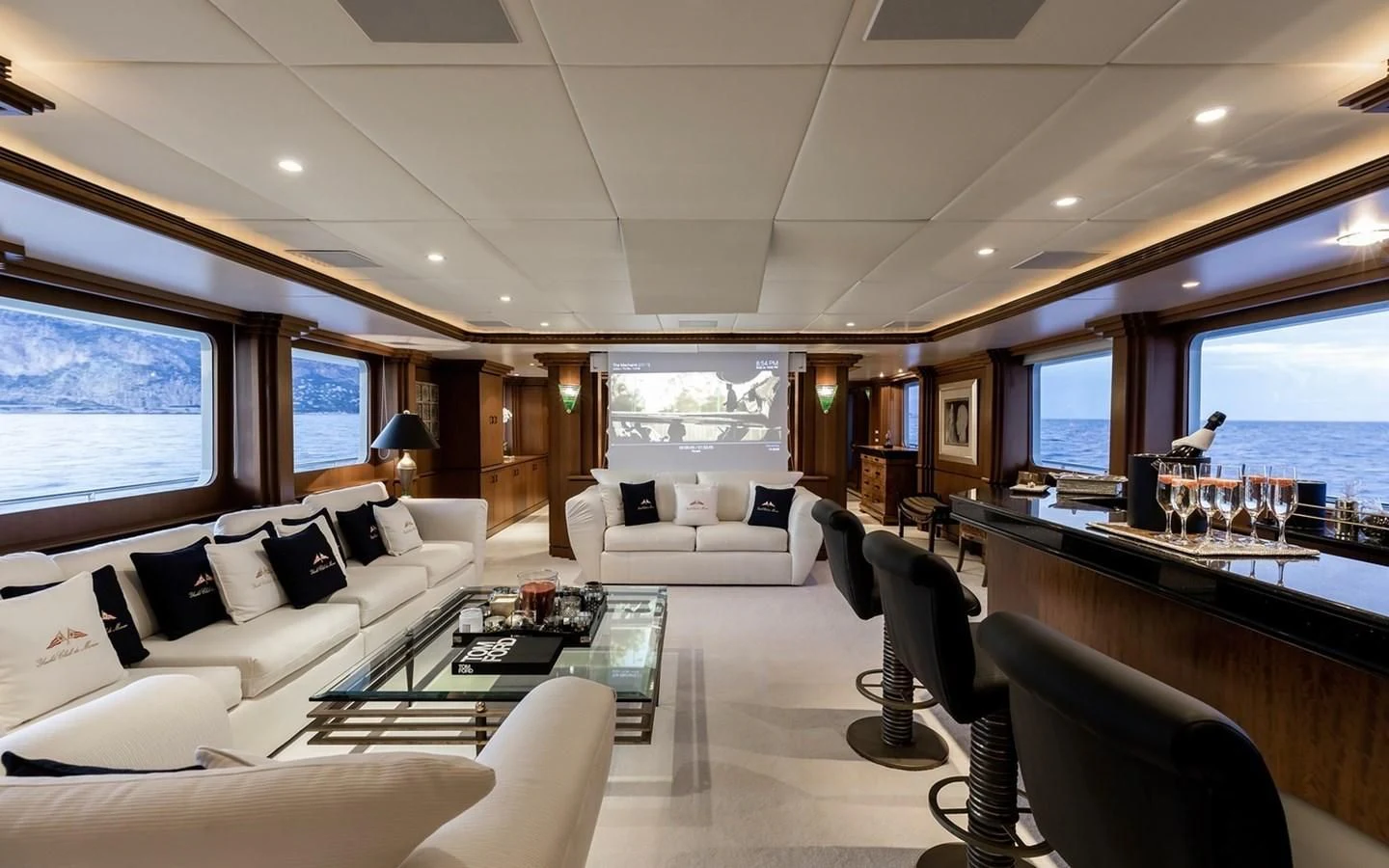a living room with a large window aboard SIERRA 2 Yacht for Sale
