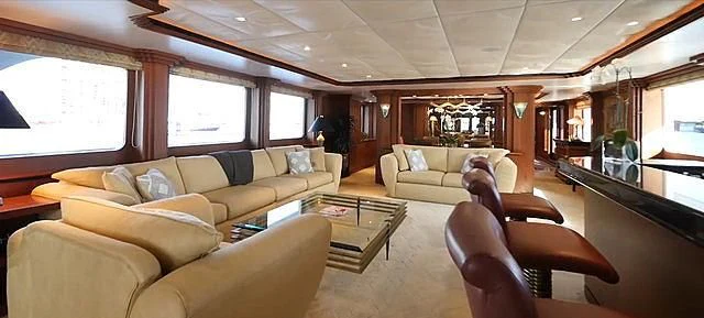 a living room with a large window aboard SIERRA 2 Yacht for Sale