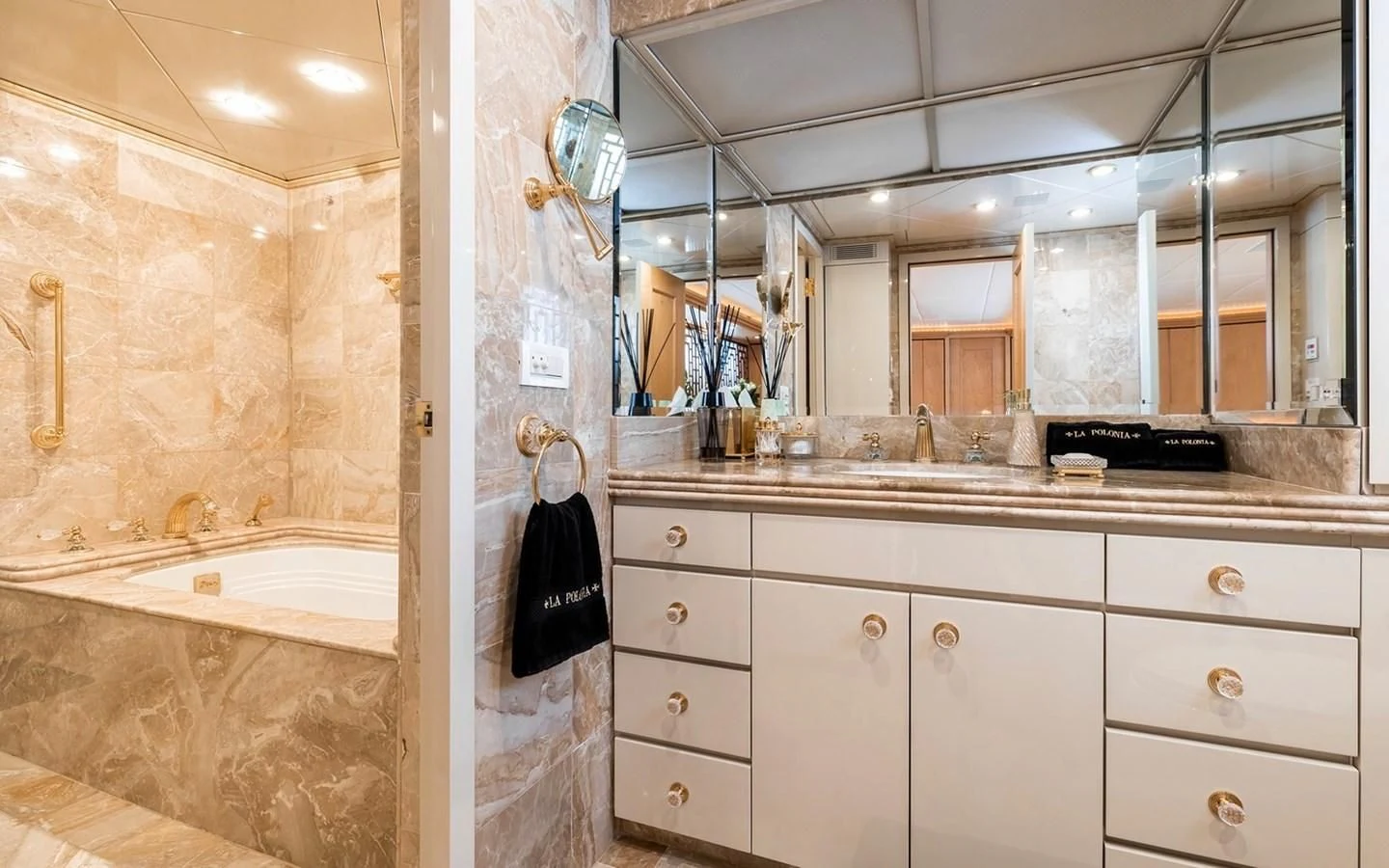 a bathroom with a large mirror aboard SIERRA 2 Yacht for Sale