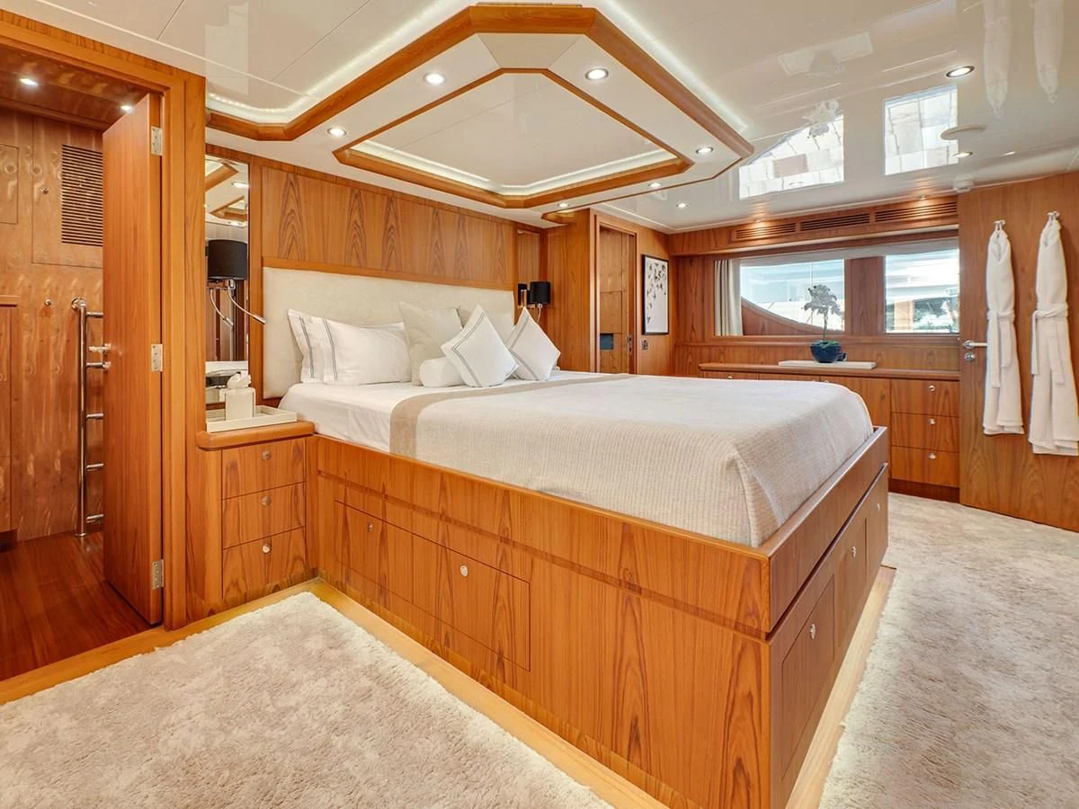 a large bedroom with a large bed aboard MOCEAN Yacht for Sale