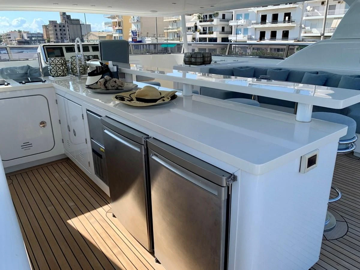 a kitchen with a large island aboard MOCEAN Yacht for Sale