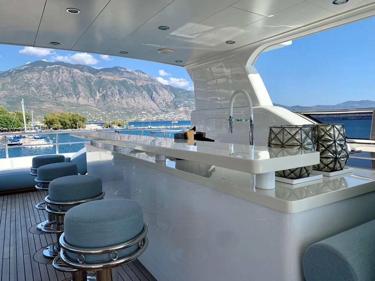 a large room with a large balcony aboard MOCEAN Yacht for Sale