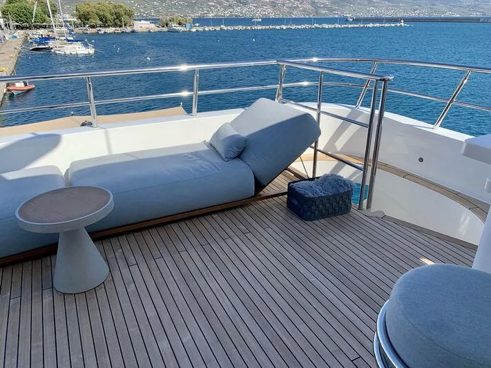 a bed on a deck aboard MOCEAN Yacht for Sale