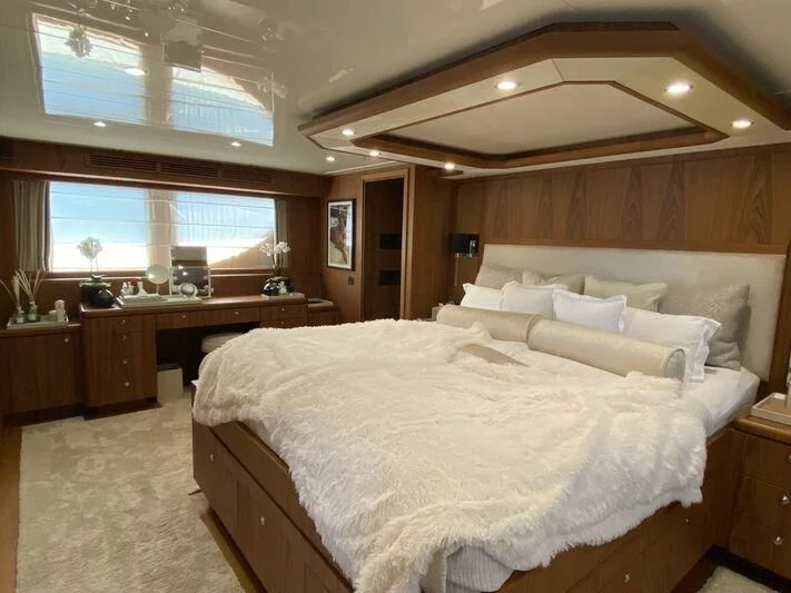 a large bedroom with a large bed aboard MOCEAN Yacht for Sale