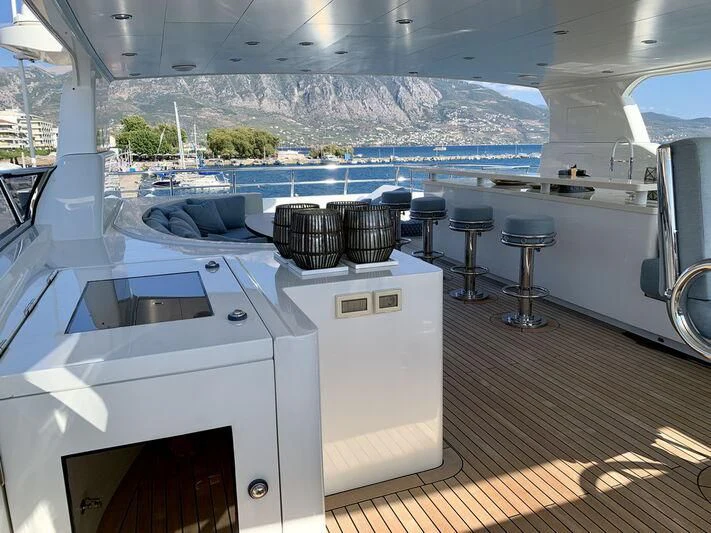 a kitchen with a large window aboard MOCEAN Yacht for Sale