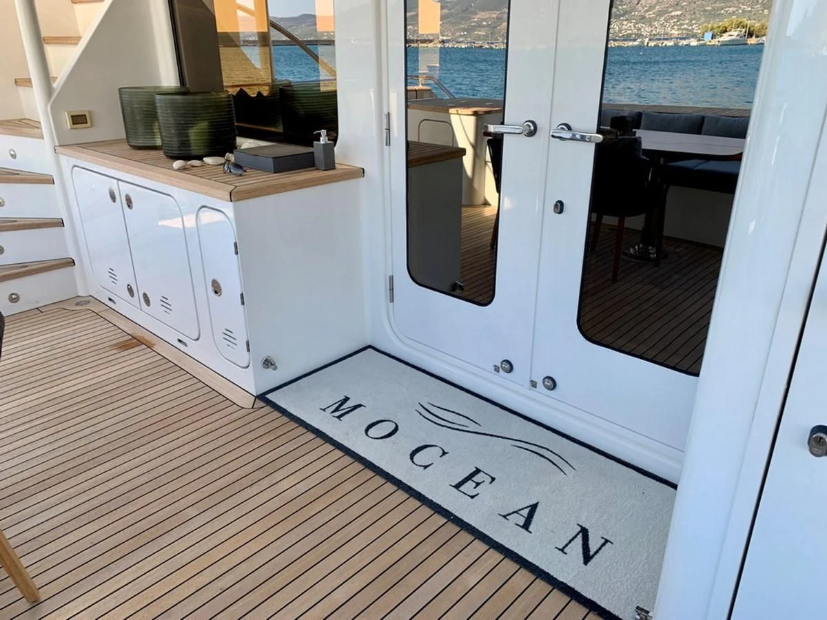 a room with a sink and cabinets aboard MOCEAN Yacht for Sale
