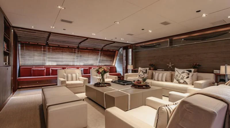 a room with couches and a table aboard ROSEHEARTY Yacht for Charter