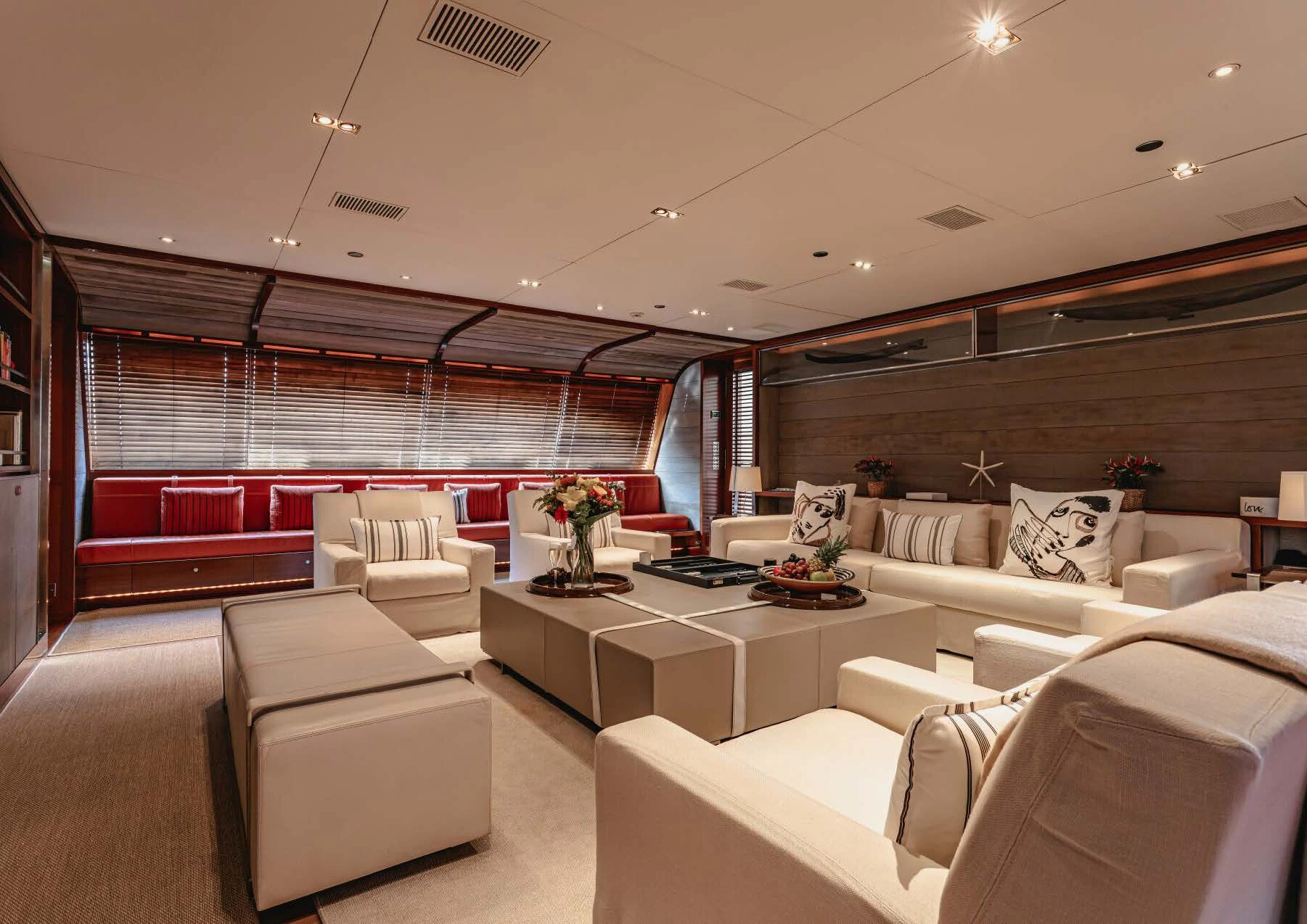 a room with couches and a table aboard ROSEHEARTY Yacht for Charter