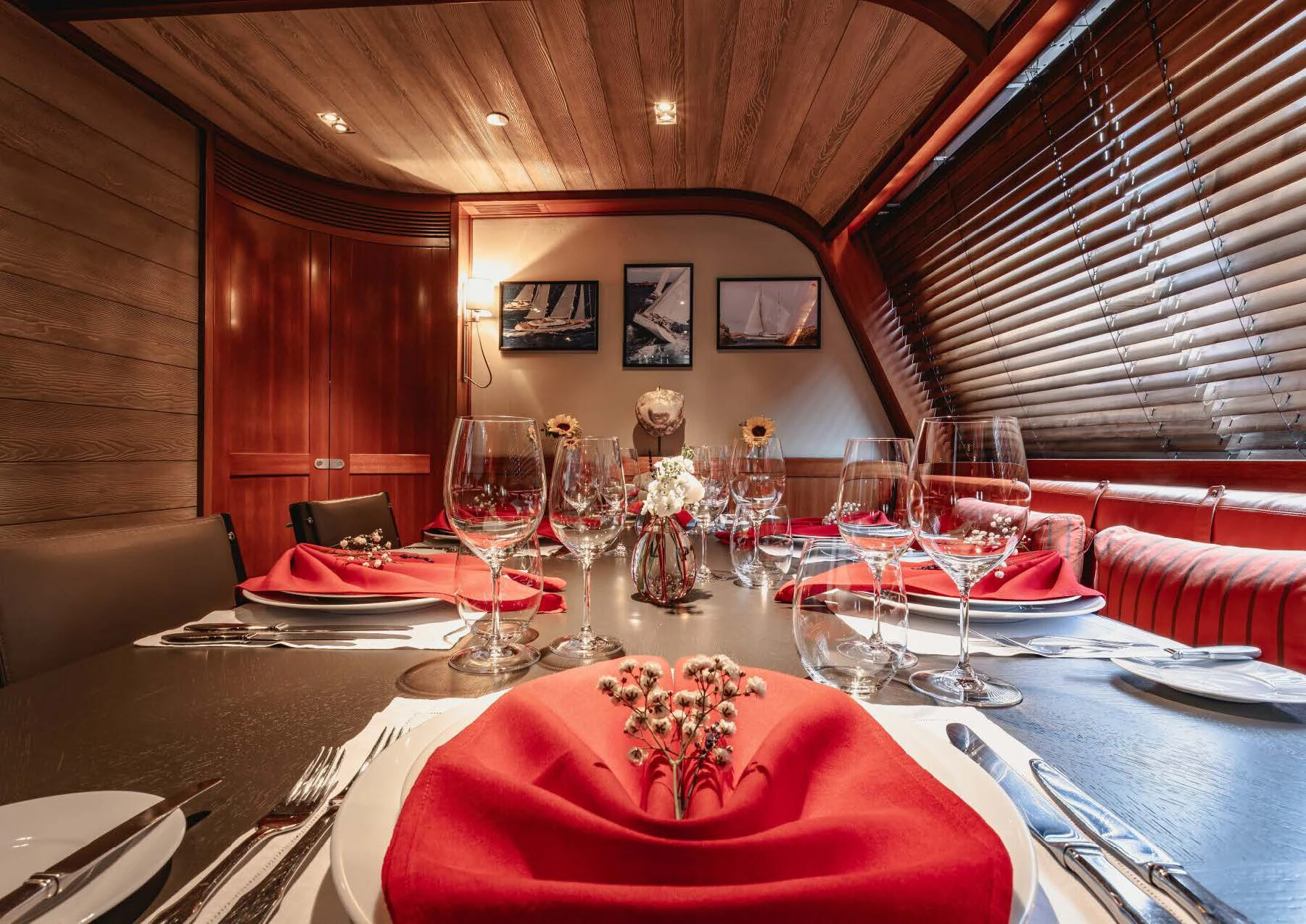a table set with place settings aboard ROSEHEARTY Yacht for Charter