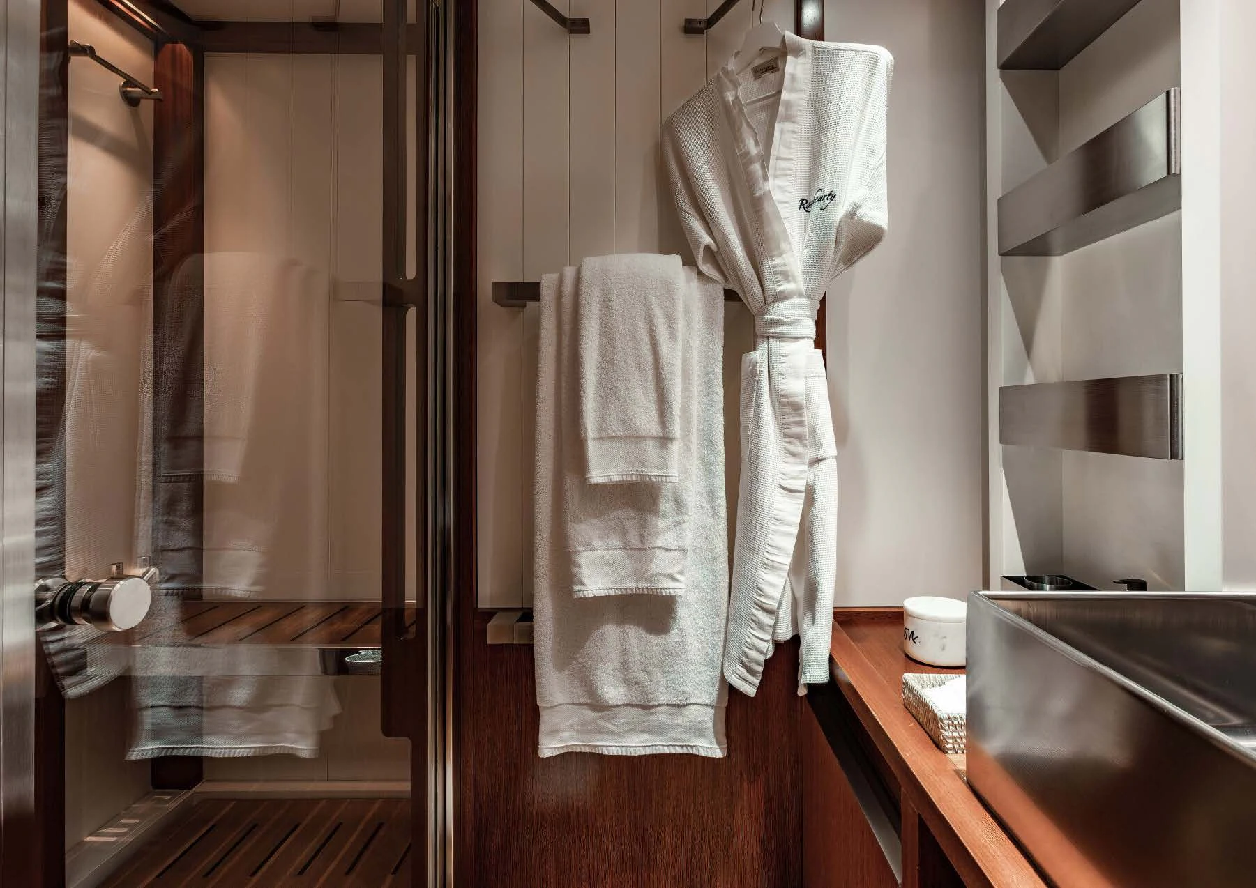 a bathroom with a sink and a mirror aboard ROSEHEARTY Yacht for Charter