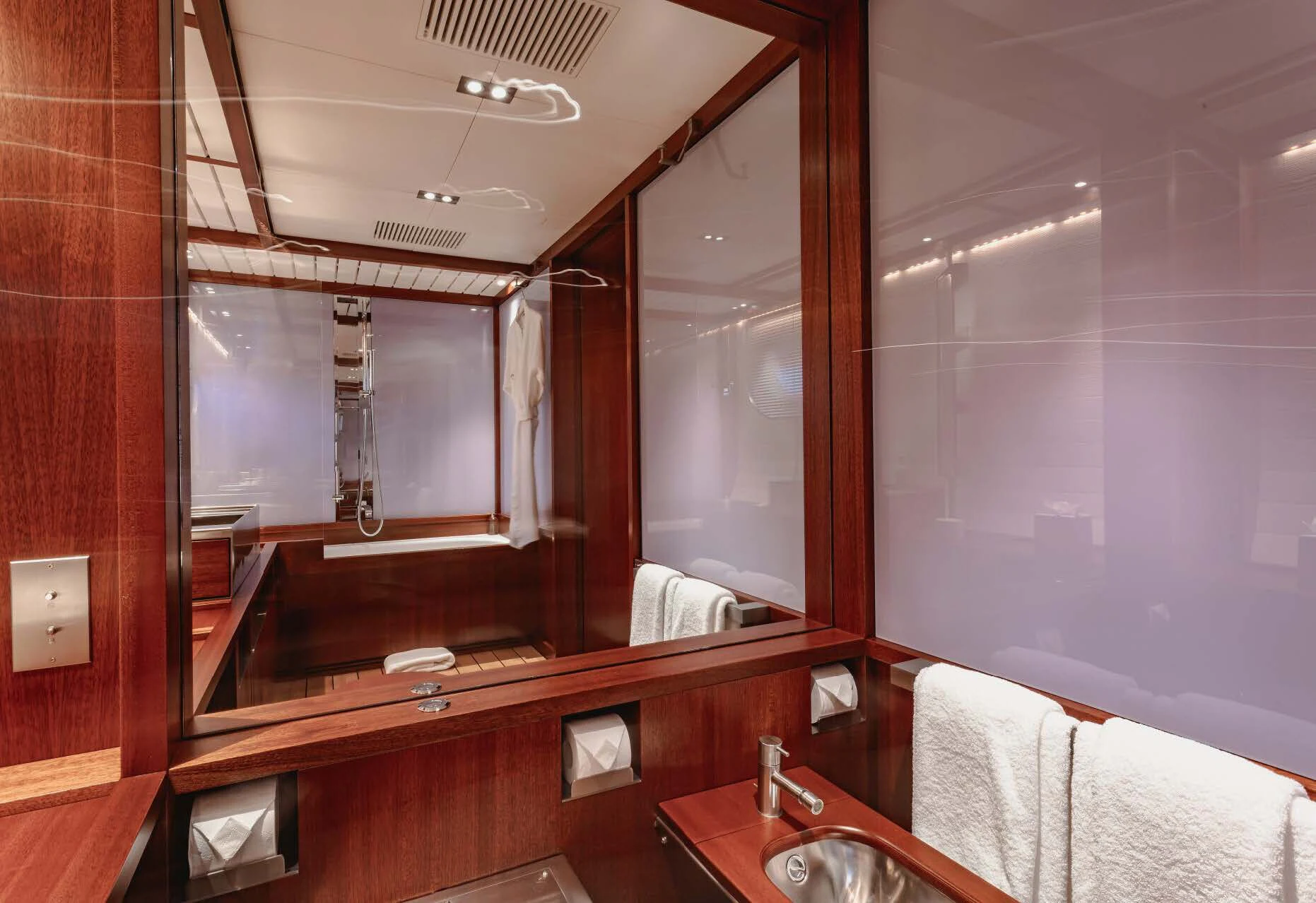 a bathroom with a large mirror aboard ROSEHEARTY Yacht for Charter