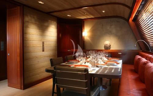 a dining table in a room aboard ROSEHEARTY Yacht for Charter
