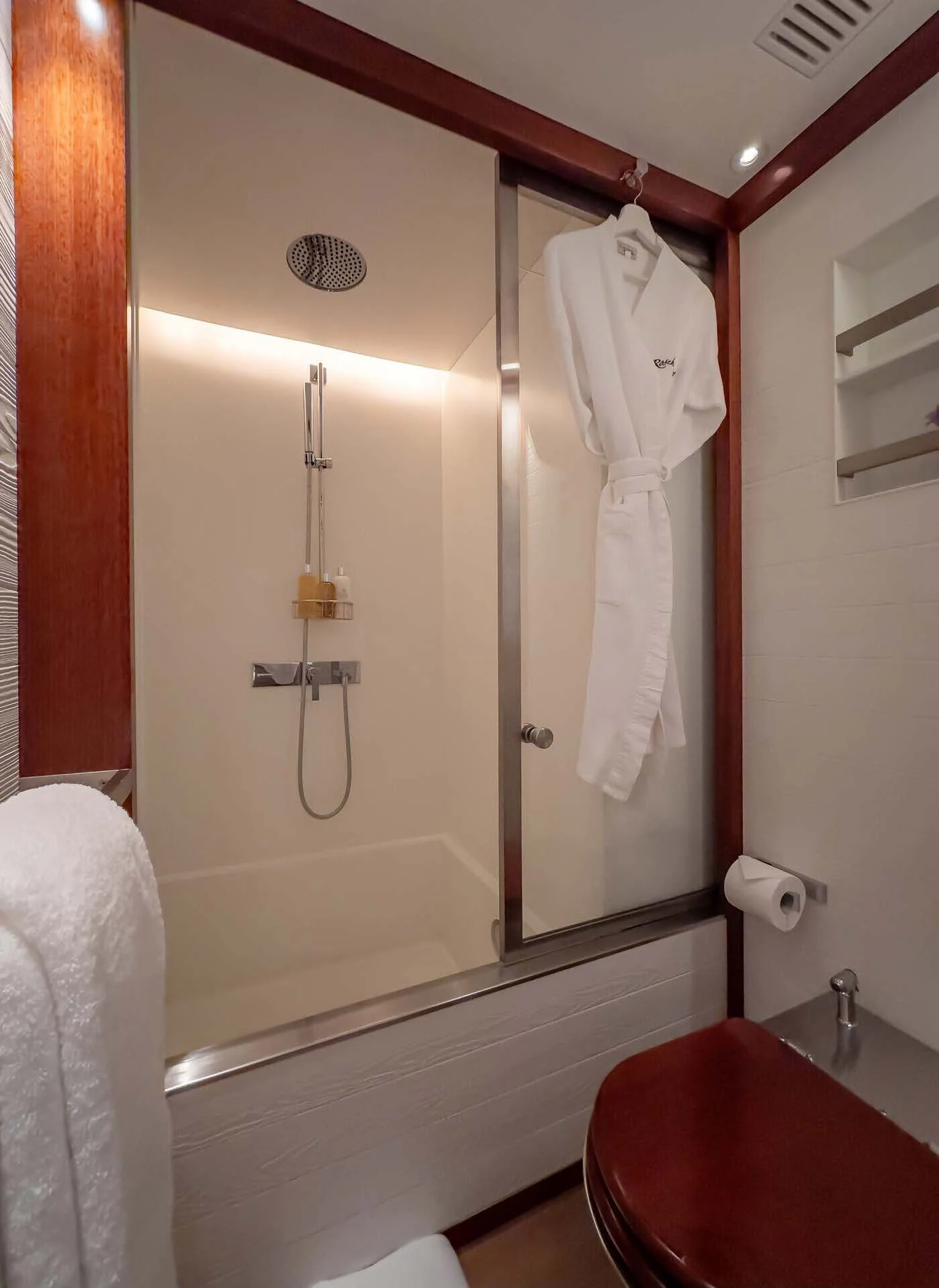 a bathroom with a shower and a sink aboard ROSEHEARTY Yacht for Charter
