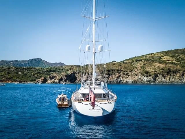 a boat sailing on the water aboard ROSEHEARTY Yacht for Charter