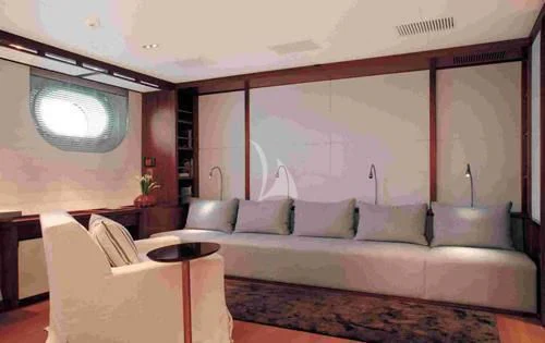 a room with a couch and a table aboard ROSEHEARTY Yacht for Charter