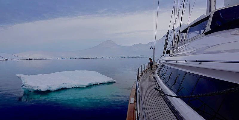 a person standing on a boat aboard ROSEHEARTY Yacht for Charter