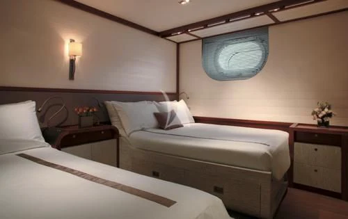 a room with two beds aboard ROSEHEARTY Yacht for Charter