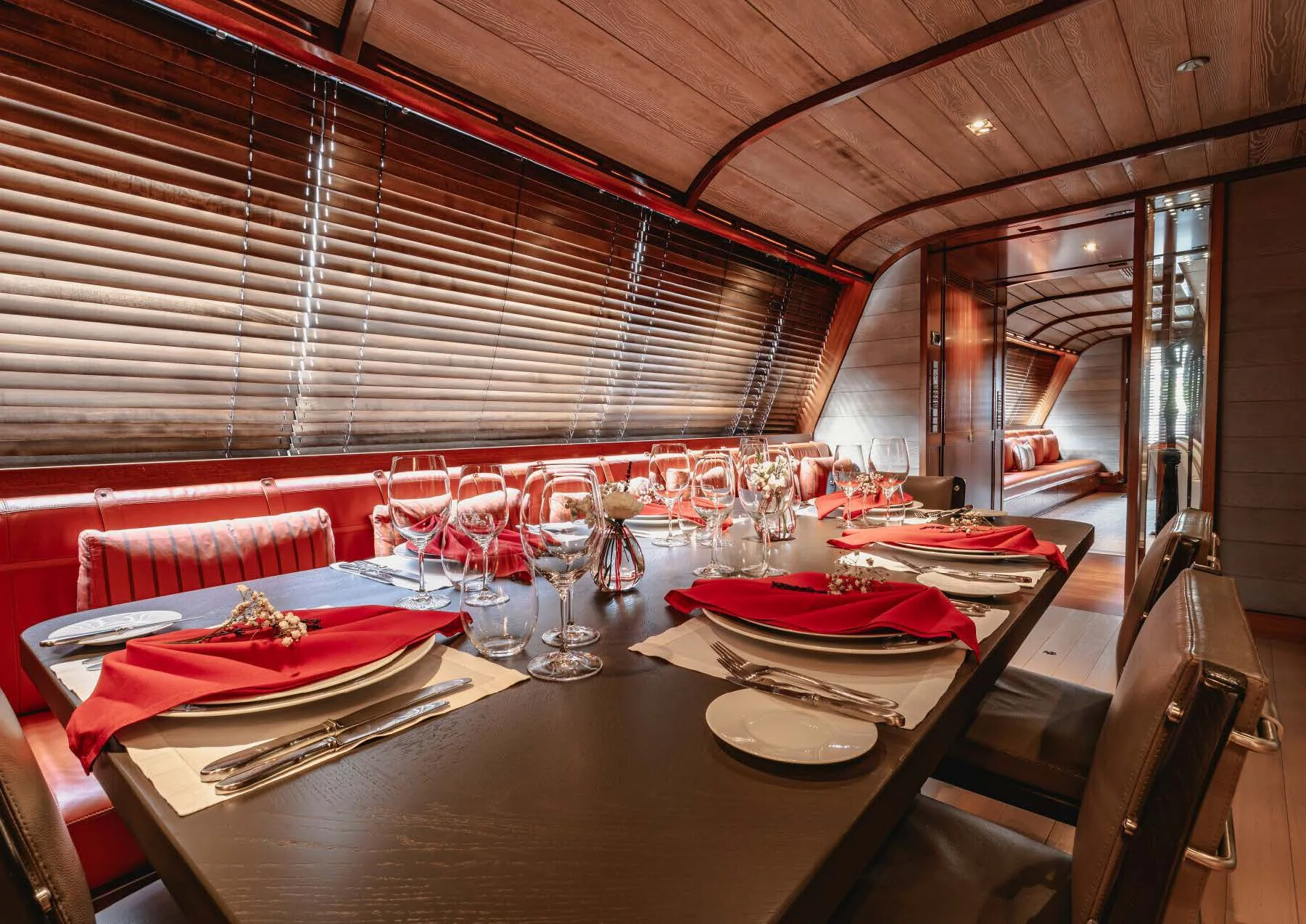 a table set for a dinner aboard ROSEHEARTY Yacht for Charter