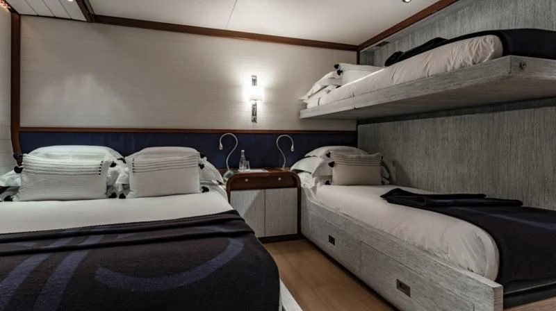 a couple of beds in a room aboard ROSEHEARTY Yacht for Charter
