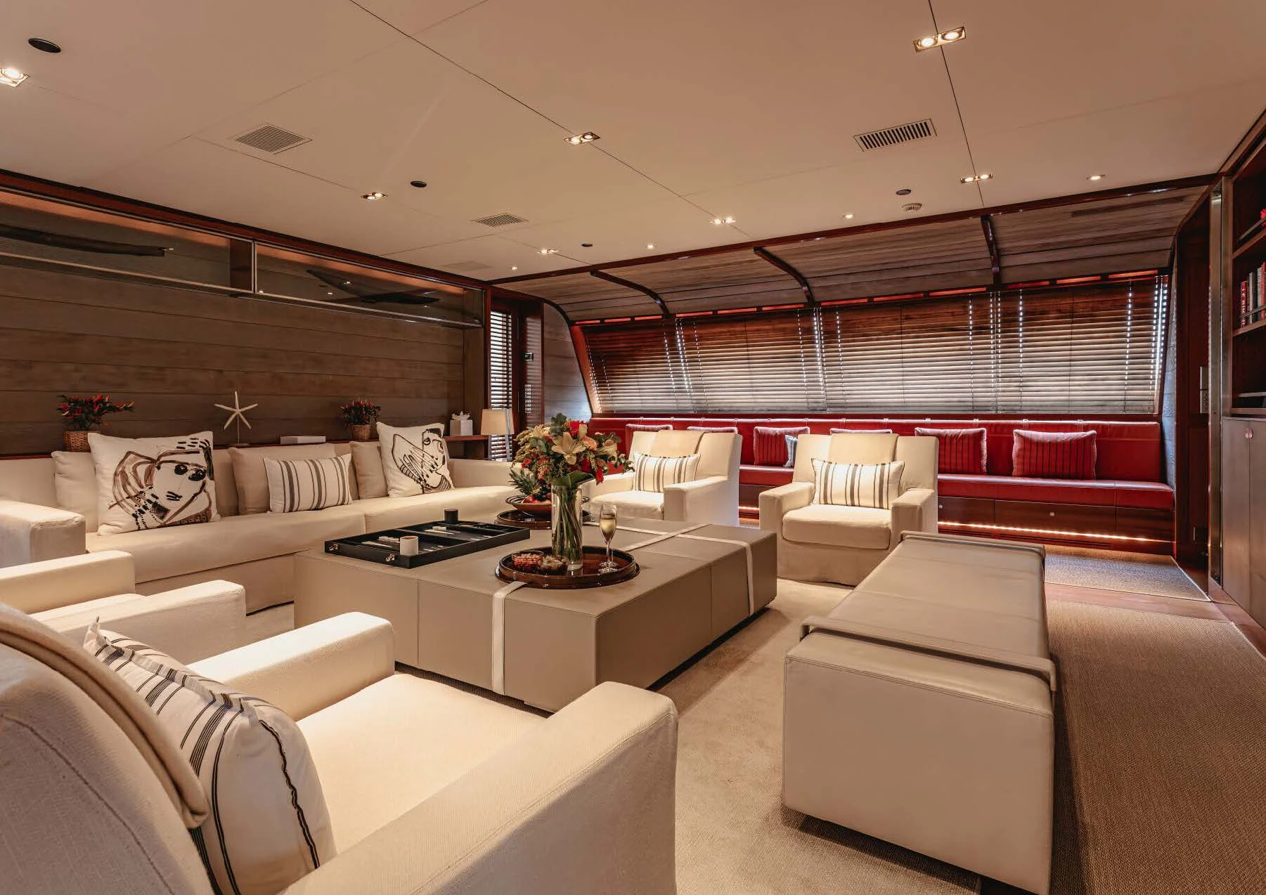 a room with couches and a table aboard ROSEHEARTY Yacht for Charter