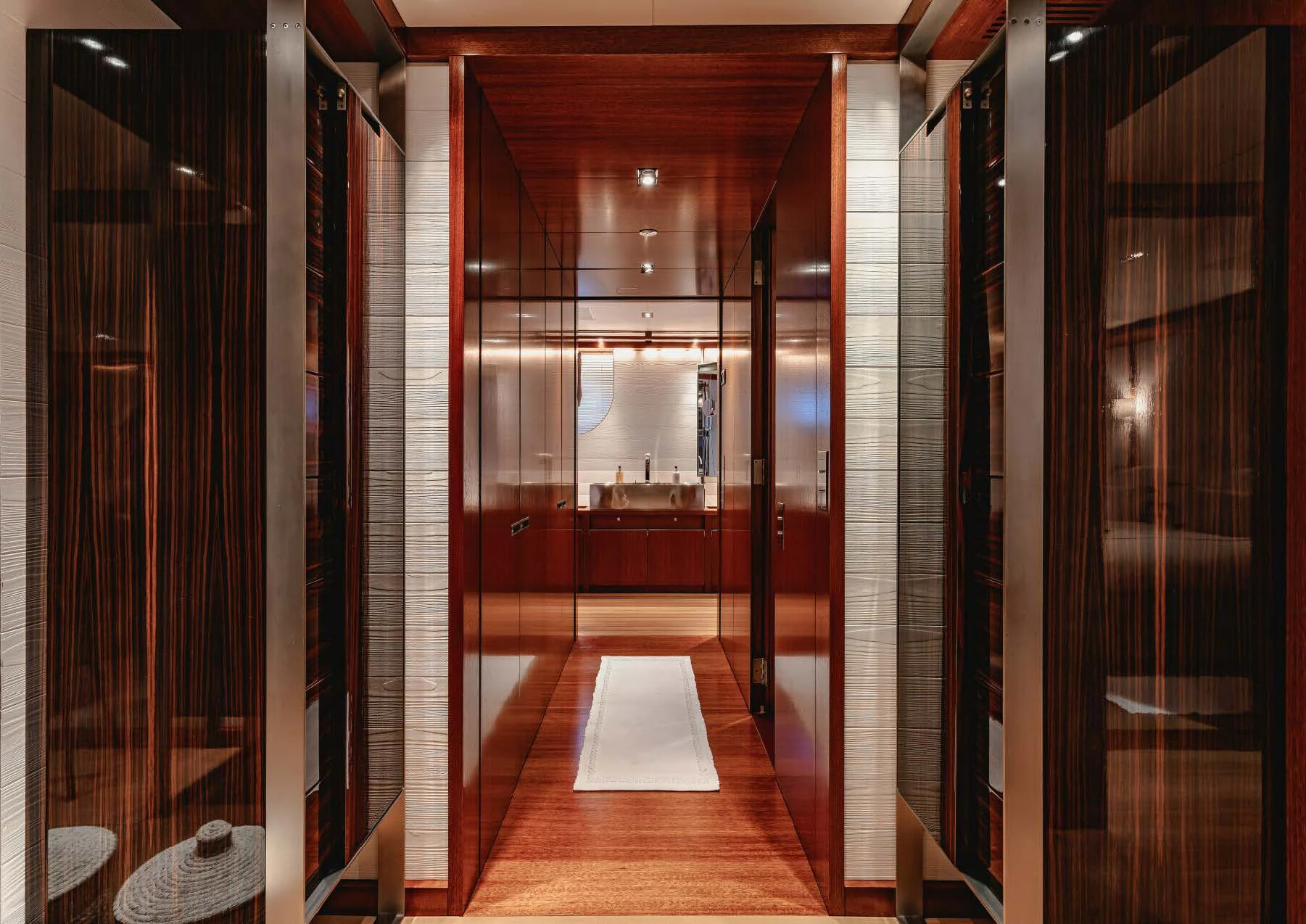 a hallway with glass doors aboard ROSEHEARTY Yacht for Charter