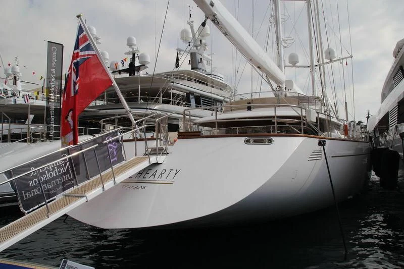 a boat with a flag on the front aboard ROSEHEARTY Yacht for Charter