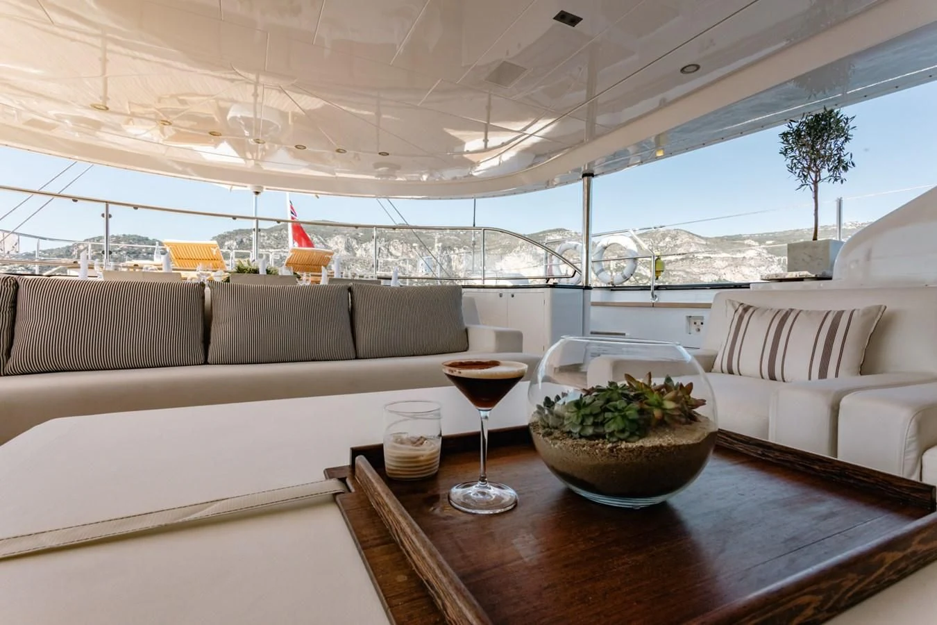 a glass of wine on a table aboard ROSEHEARTY Yacht for Charter