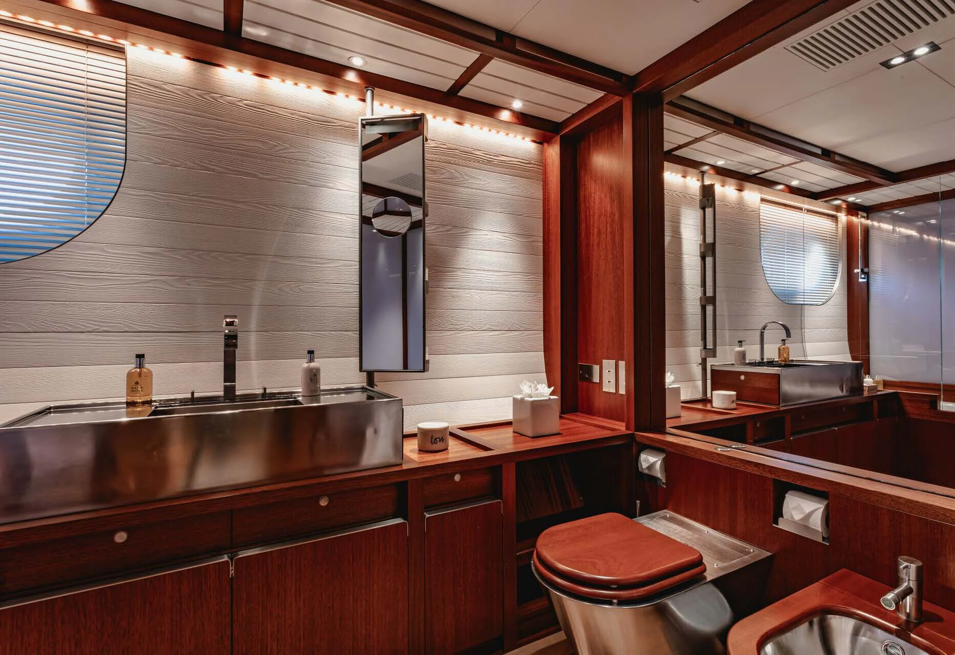 a bathroom with a sink and a toilet aboard ROSEHEARTY Yacht for Charter