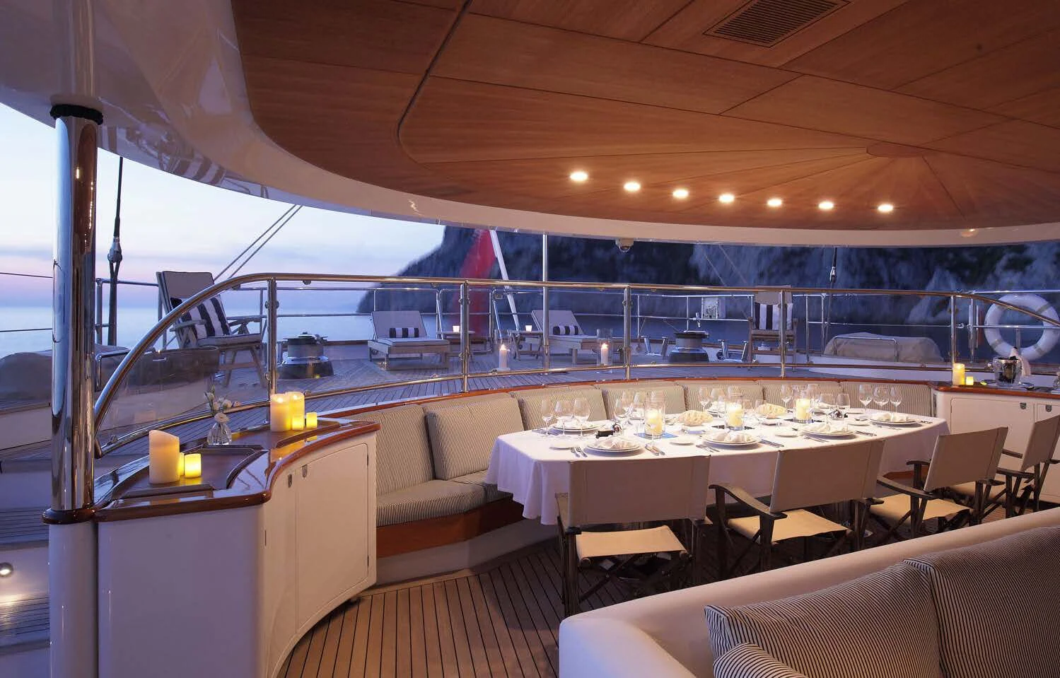 a room with a table and chairs aboard ROSEHEARTY Yacht for Charter