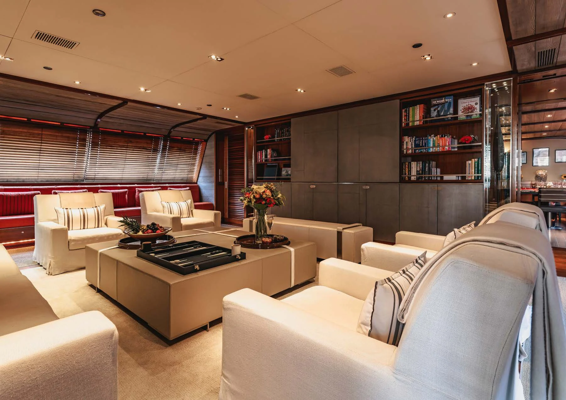 a room with couches and a table aboard ROSEHEARTY Yacht for Charter