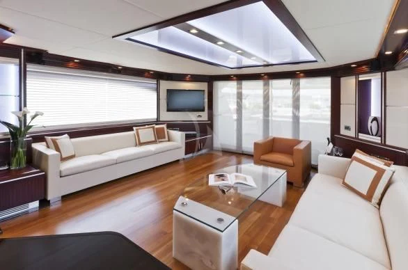 a living room with a large window aboard NASEEM Yacht for Sale