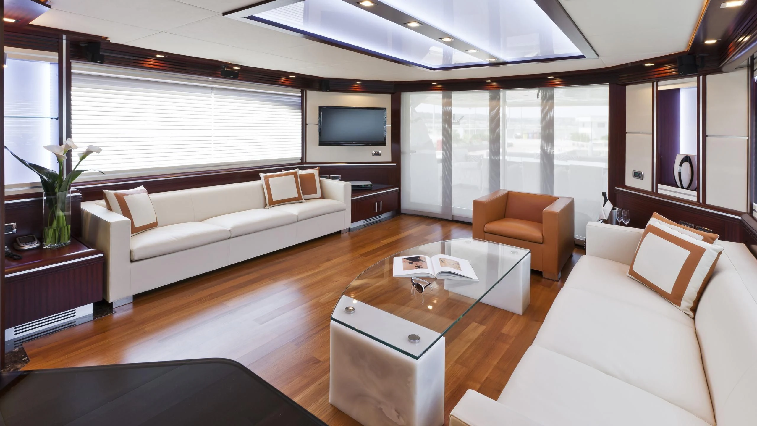 a living room with a large window aboard NASEEM Yacht for Sale