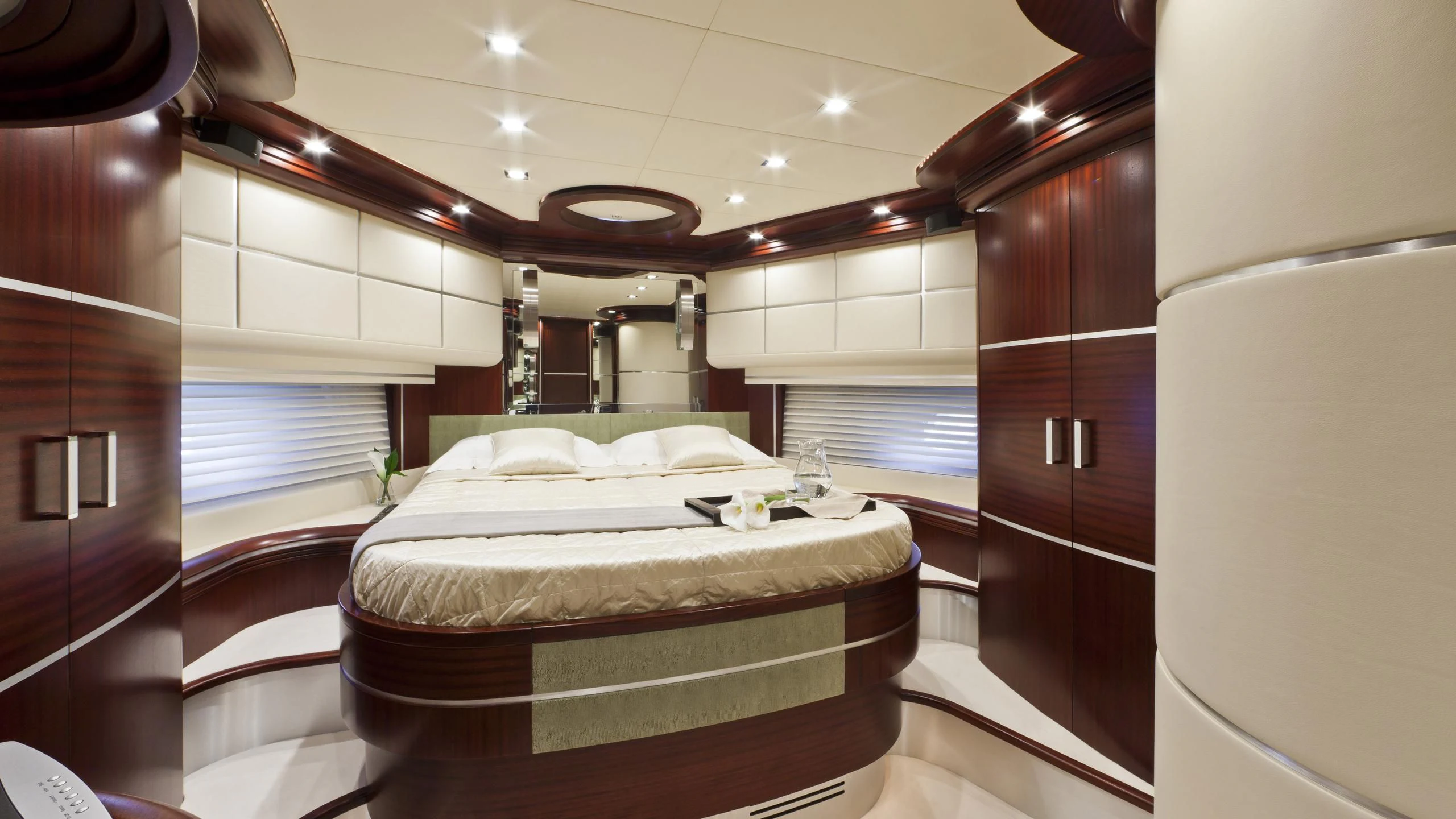 a large bed in a room aboard NASEEM Yacht for Sale