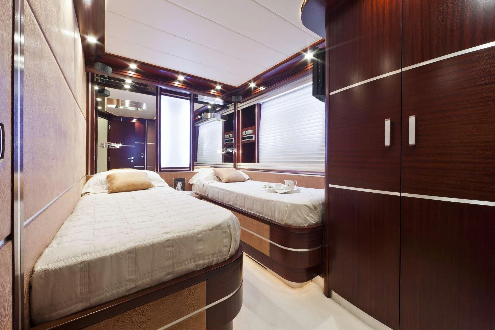 a room with two beds aboard NASEEM Yacht for Sale
