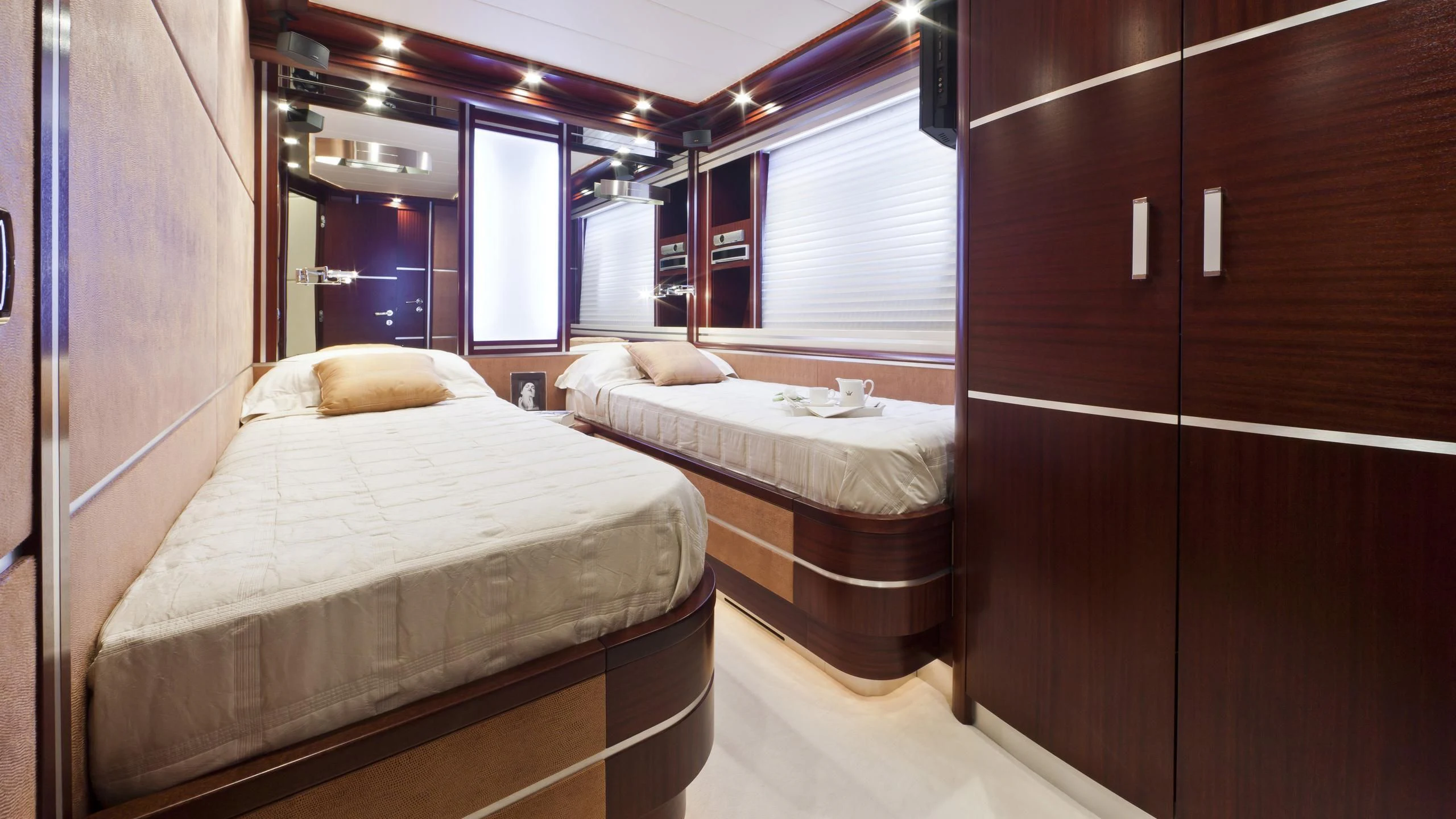 a room with two beds aboard NASEEM Yacht for Sale