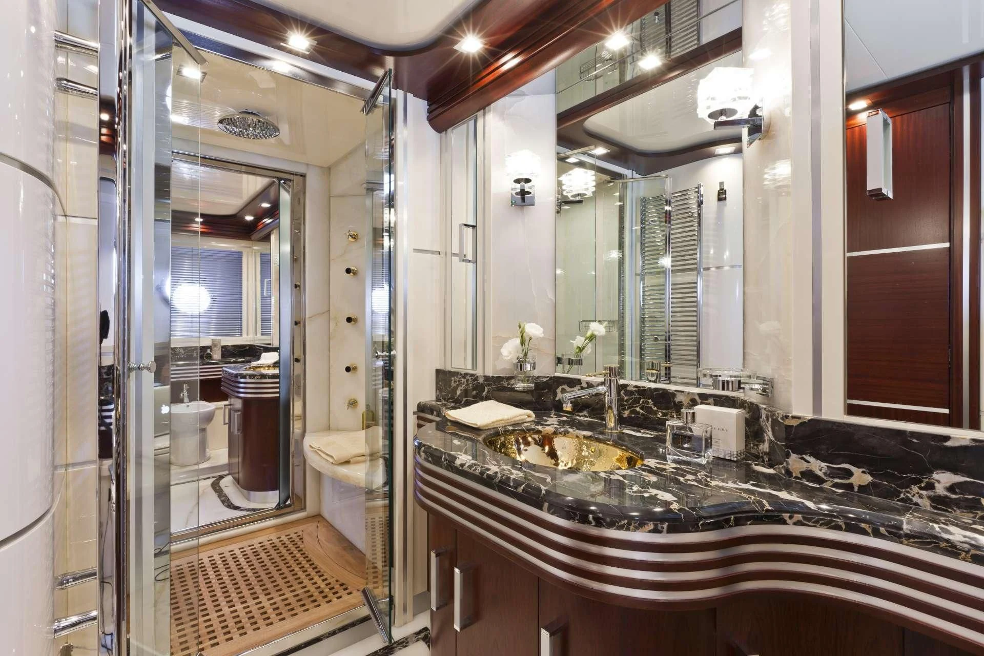 a bathroom with a large countertop aboard NASEEM Yacht for Sale