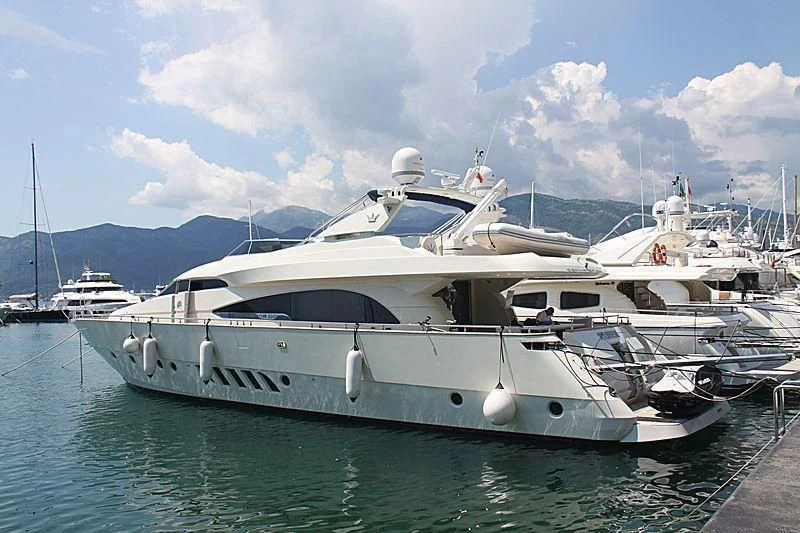 a group of boats are parked in a harbor aboard NASEEM Yacht for Sale