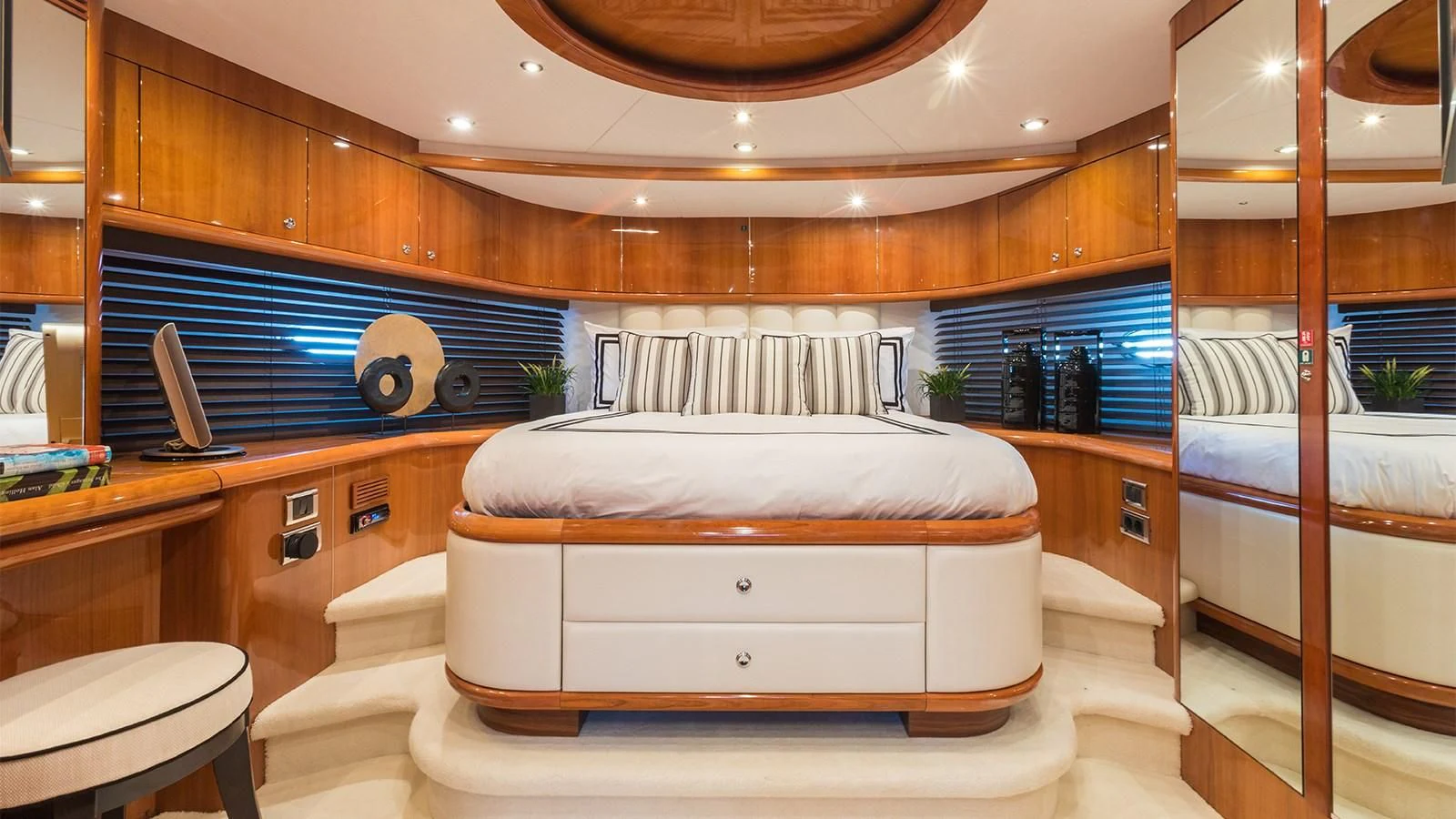 a room with a bed and a desk aboard WINNING STREAK 2 Yacht for Sale