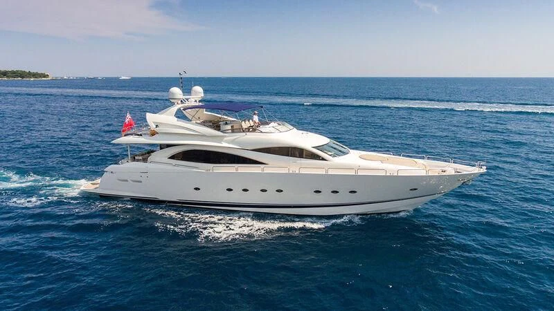 a white yacht on the water aboard WINNING STREAK 2 Yacht for Sale
