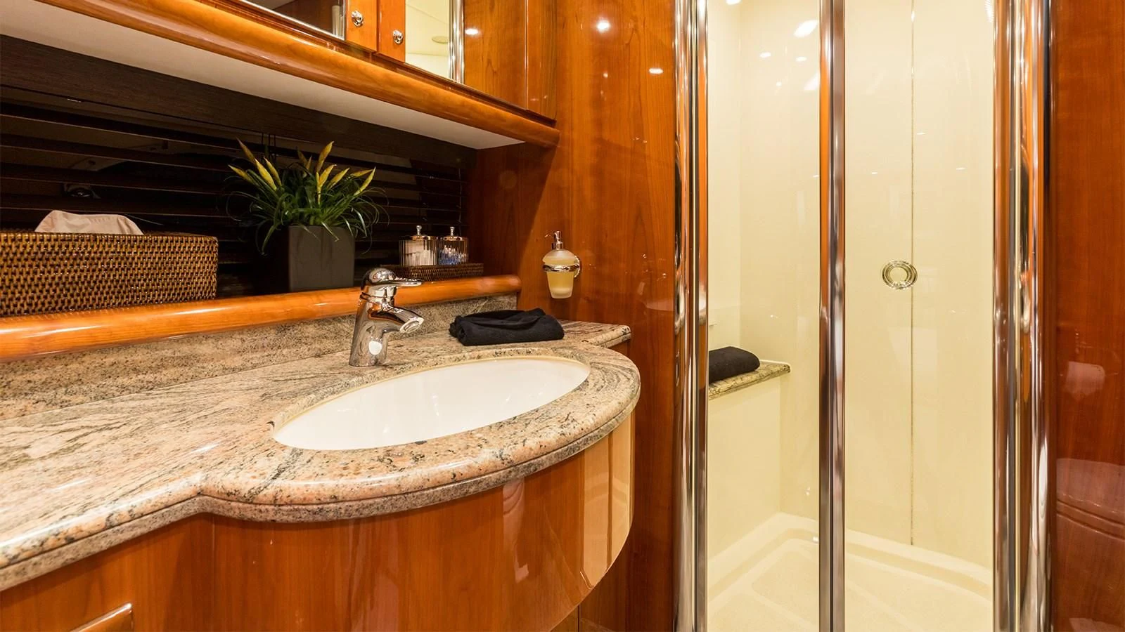 a bathroom with a sink and a shower aboard WINNING STREAK 2 Yacht for Sale
