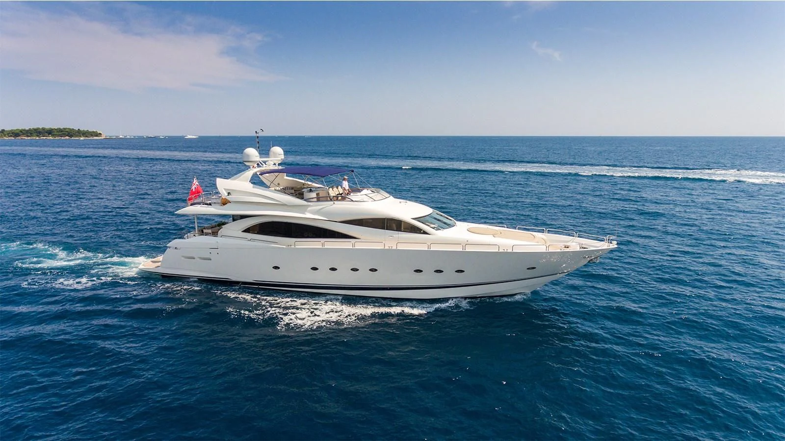 a white boat on the water aboard WINNING STREAK 2 Yacht for Sale