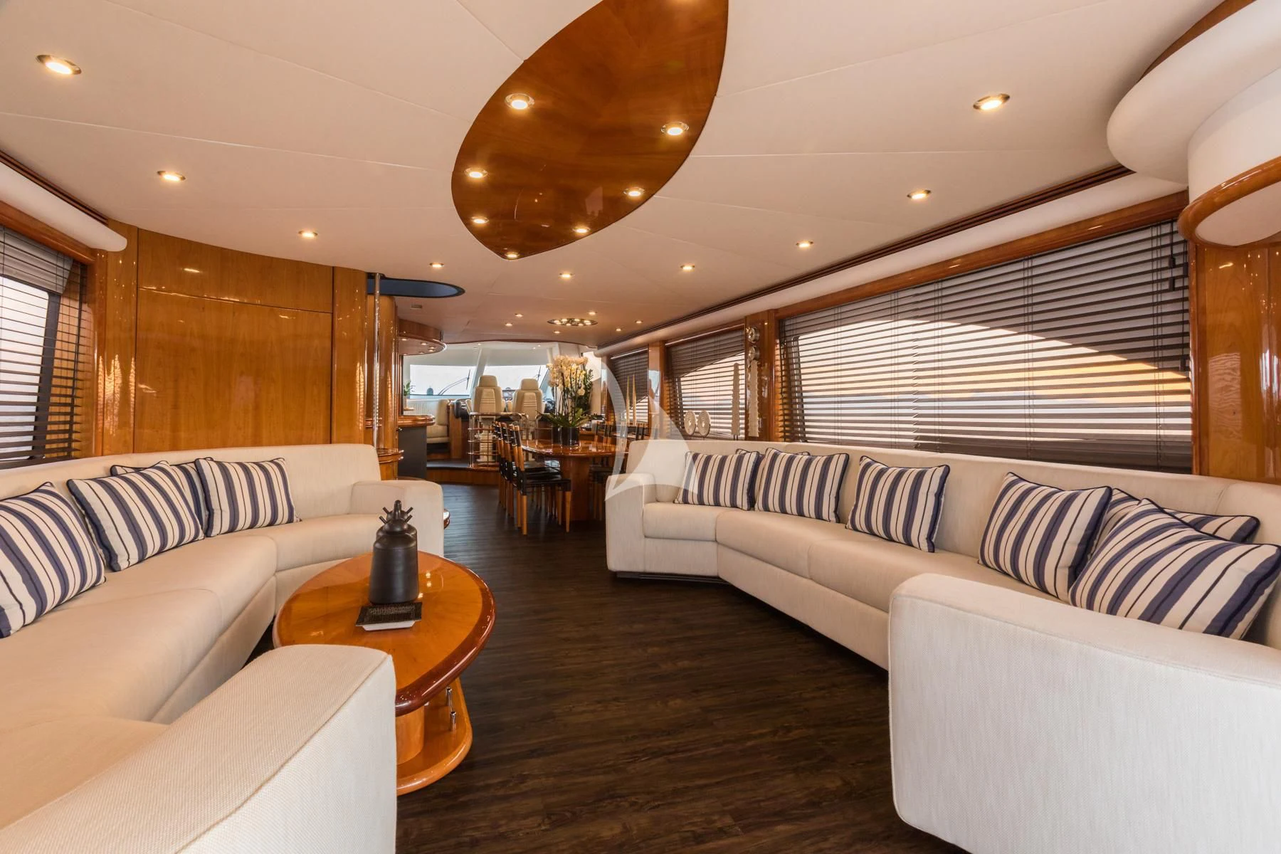 a living room with a couch and a table aboard WINNING STREAK 2 Yacht for Sale